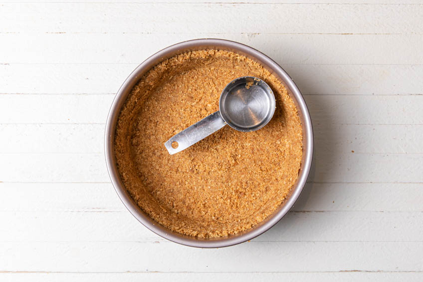 Graham cracker crust in a pan