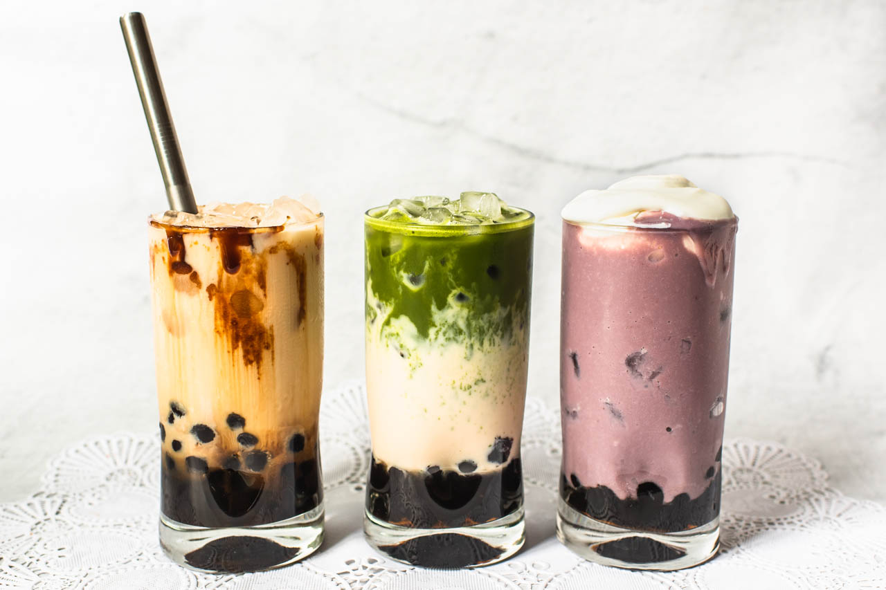 Three different bubble teas in glasses