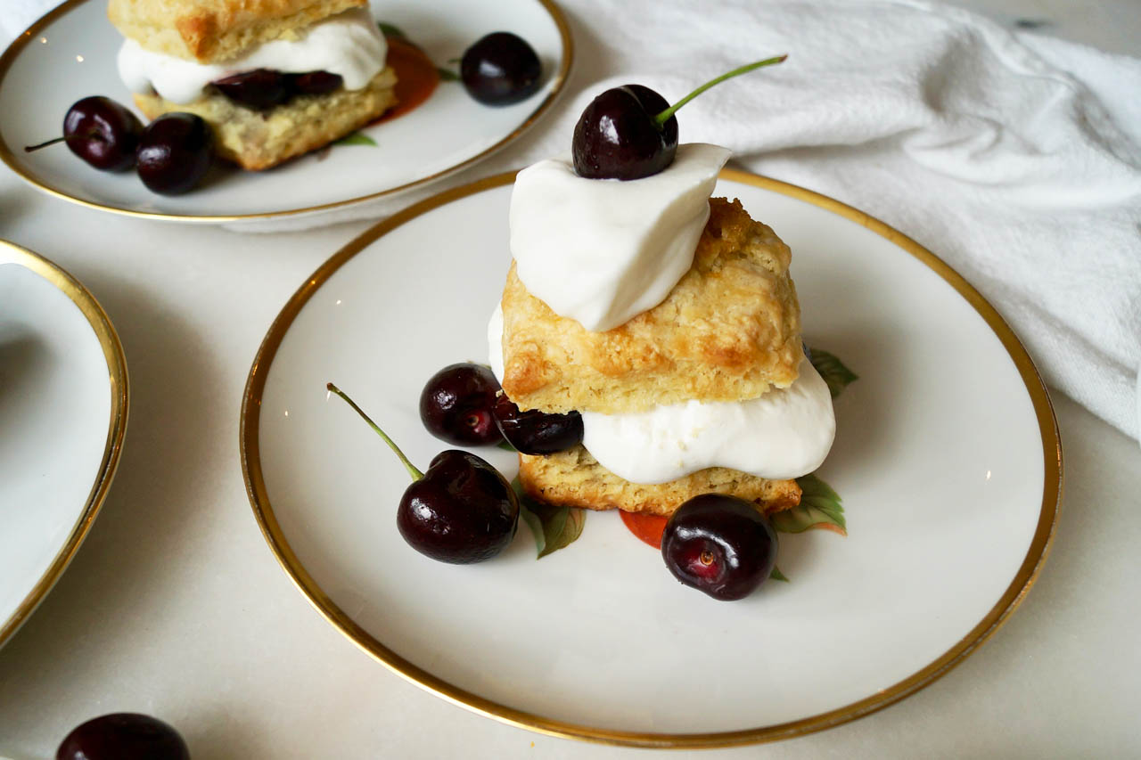 Cherry shortcake with yogurt whipped cream on a plate