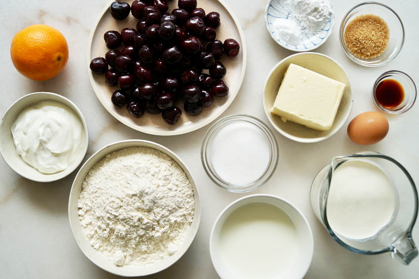 Ingredients for cherry shortcakes with yogurt whipped cream