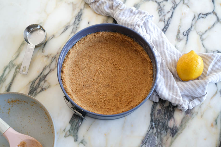 Graham cracker crust in a springform pan