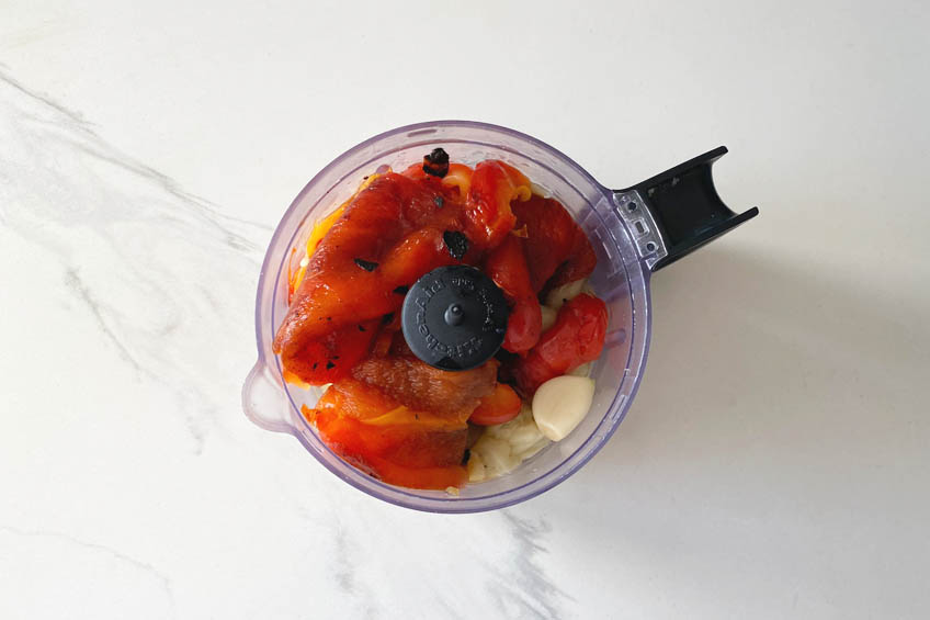 Roasted eggplant, red peppers and garlic in a food processor