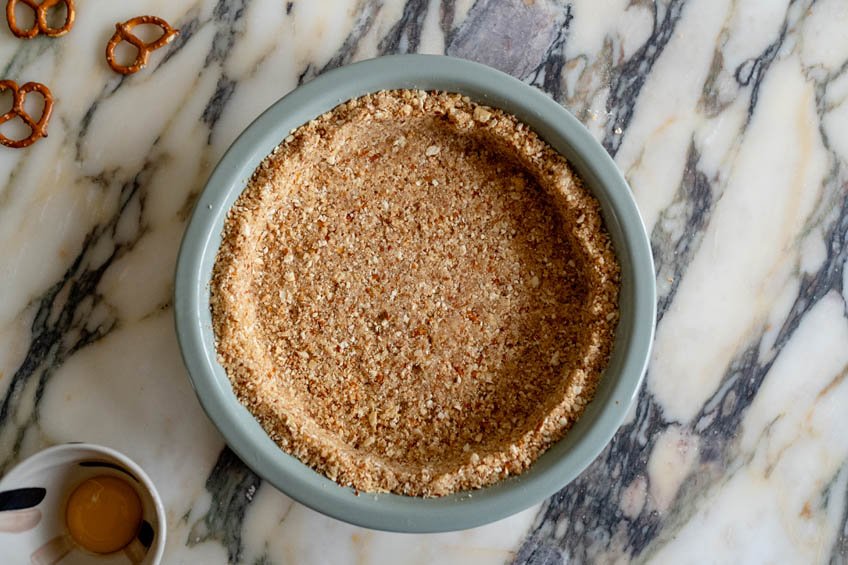 Pretzel saltine crust in a pie dish