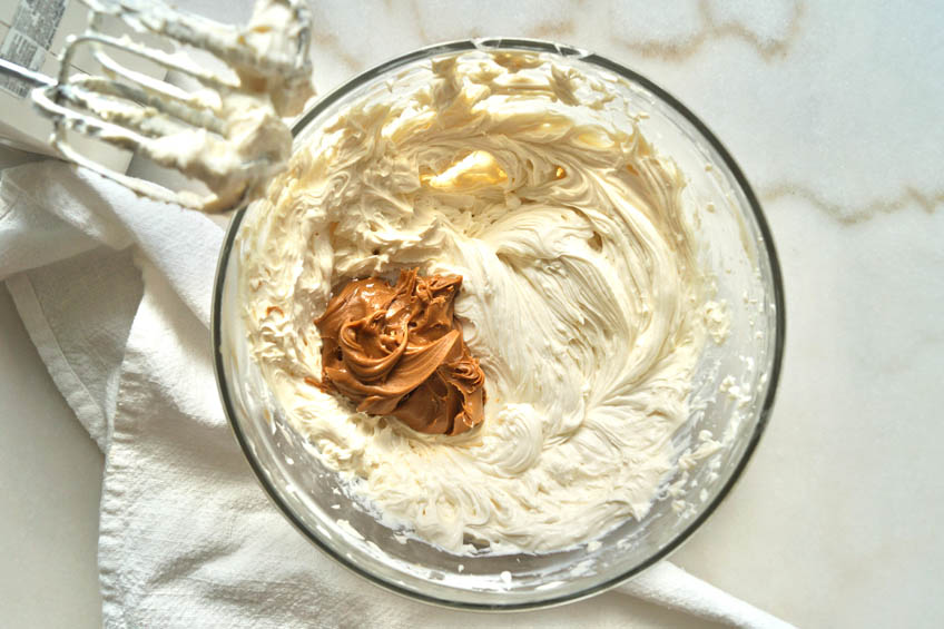 Cheesecake filling ingredients in a bowl