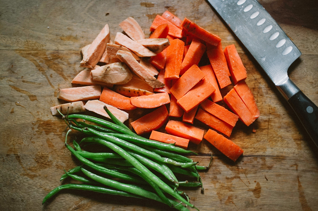 Chopped veggies on a wooden cutting board