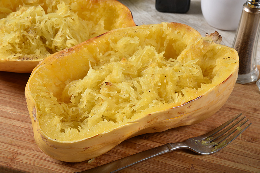 Fresh baked and halved spaghetti squash.