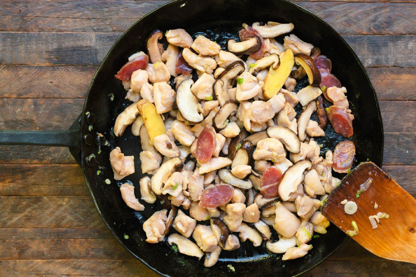 Rice cooker dinner toppings sauteing in a pan