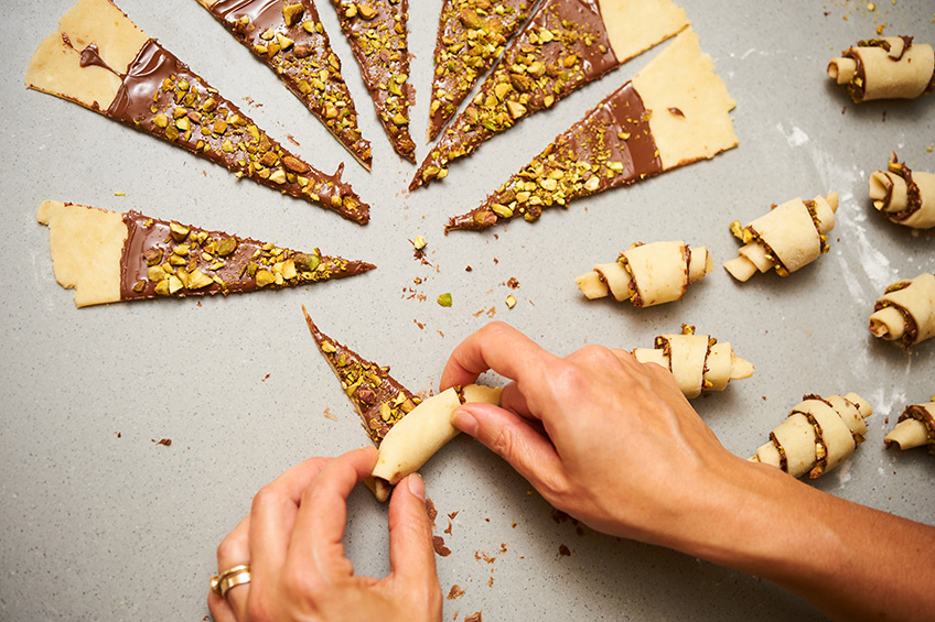 Tamara rolling the Nutella an pistachio-filled rugelach dough