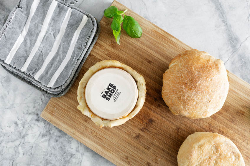 Ramekin flipped upside down with pizza pot pie inside