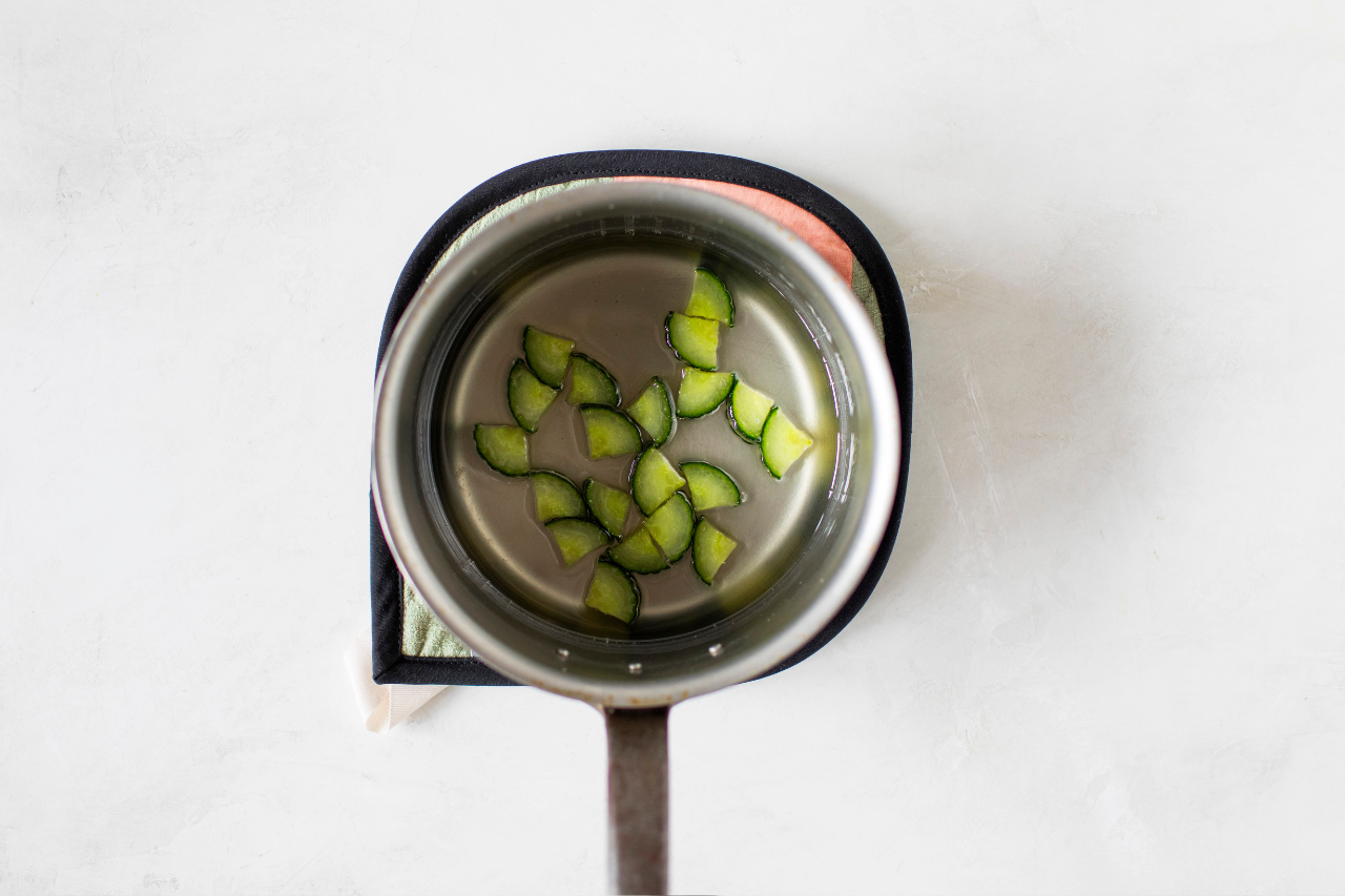 Cucumber syrup cooling in a saucepan