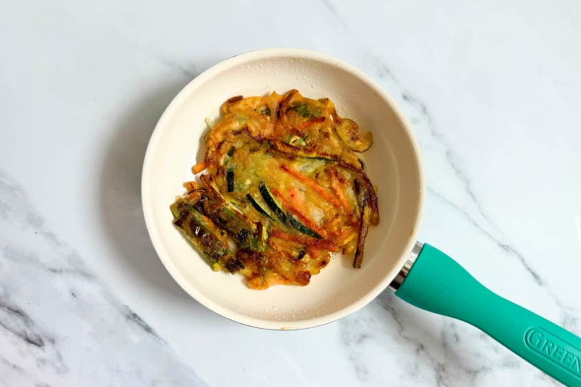 Korean vegetable pancake in a frying pan