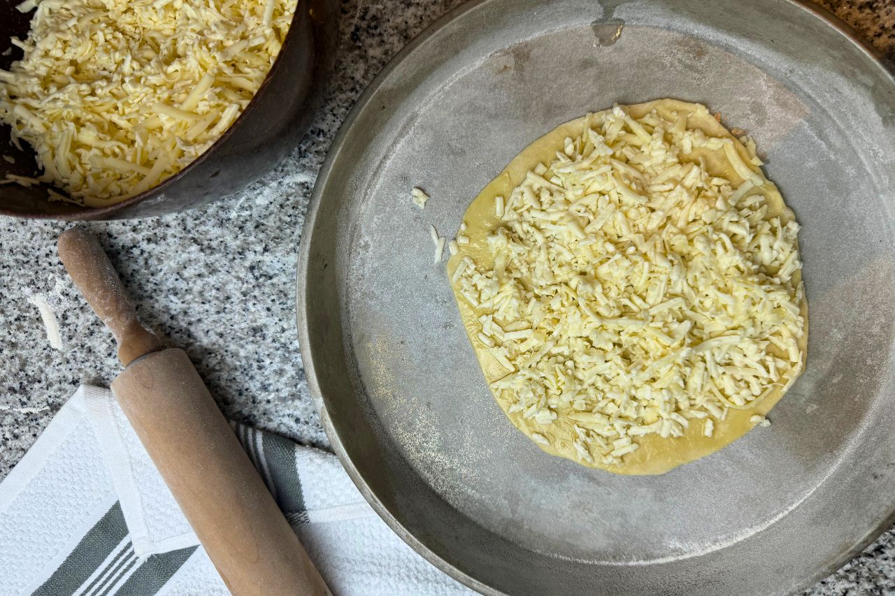 Cheese manakeesh on a baking tray