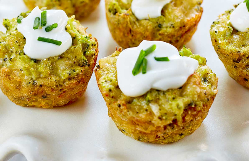 Broccoli cheddar bites topped with sour cream