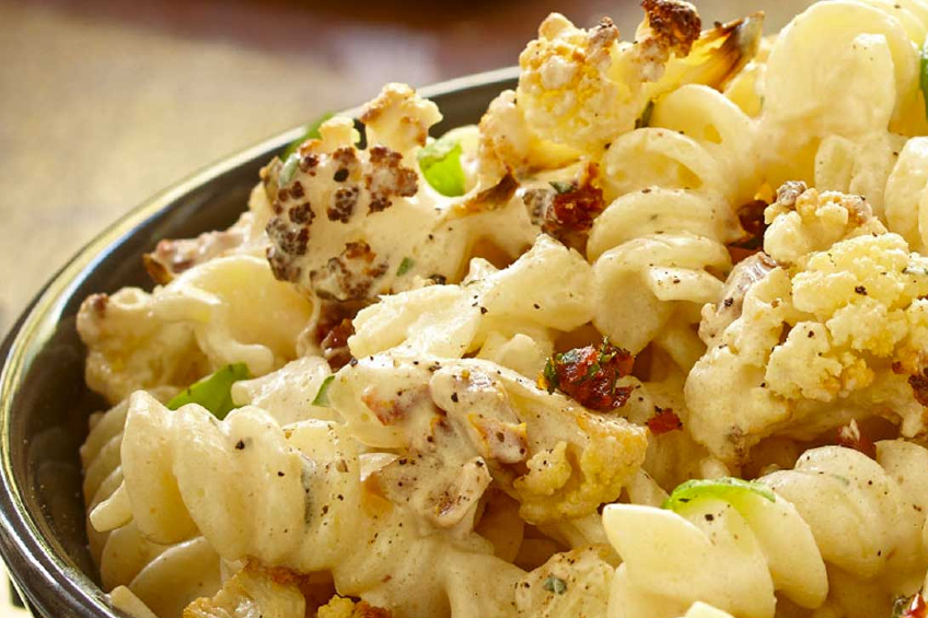 A bowl of creamy cauliflower pasta