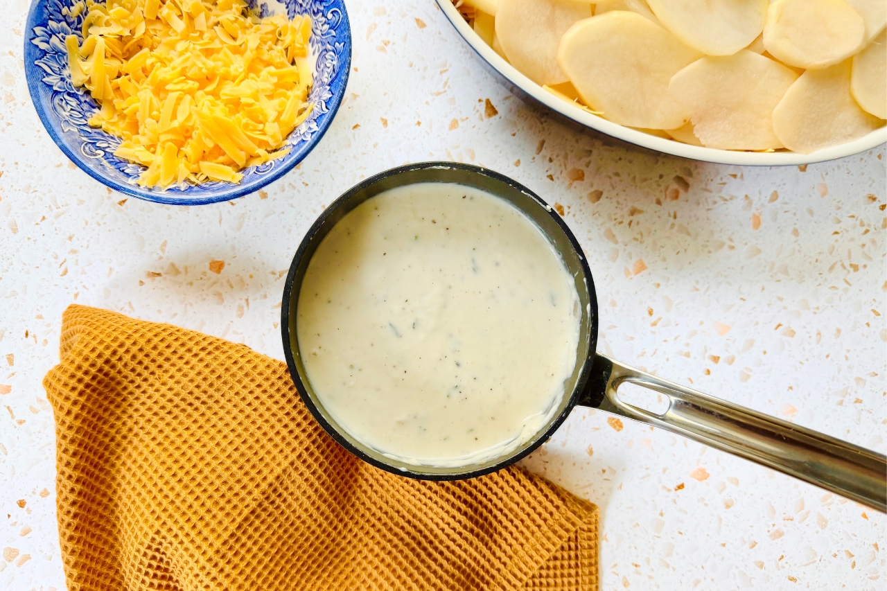 Cheese sauce in saucepan