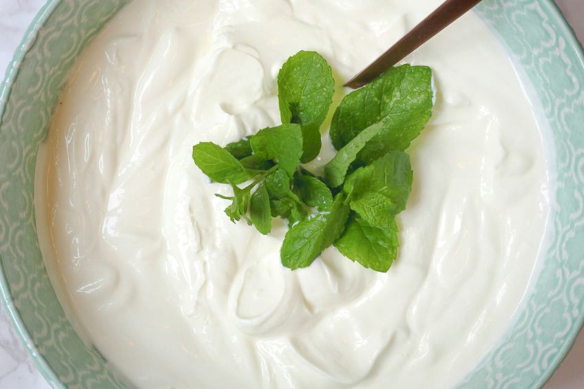 Close up of yogurt with mints on top- egg replacements