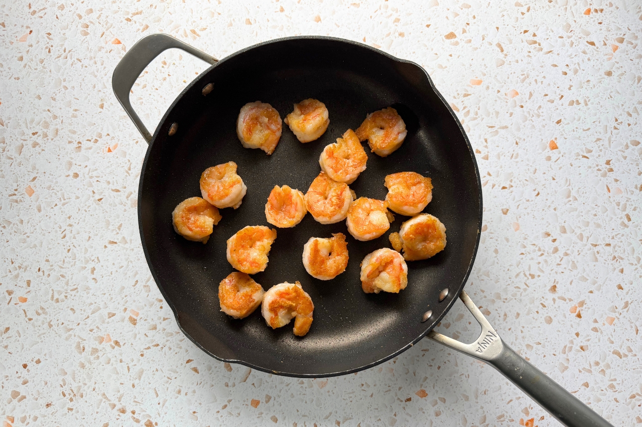 Shrimp frying in pan