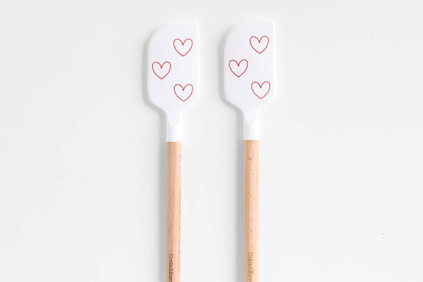 White spatulas with wooden handles