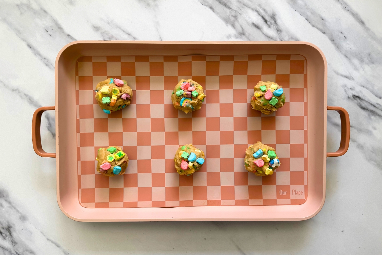 Unbaked lucky marshmallow cookies on a baking sheet