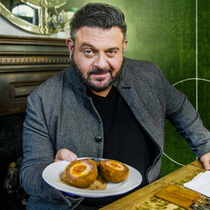 Adam Richman Eats Football