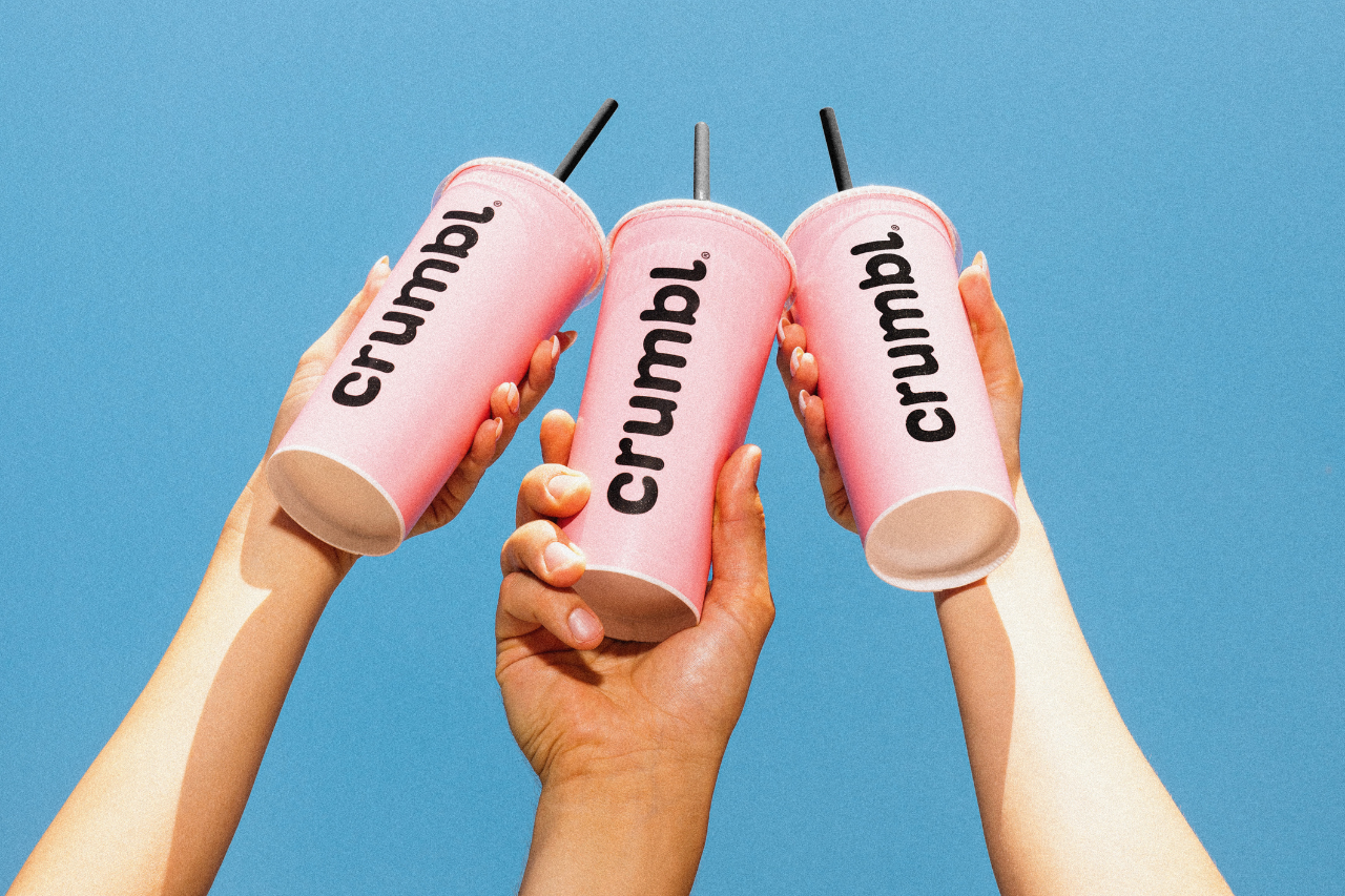 Three pink Crumbl Dirty Soda cups